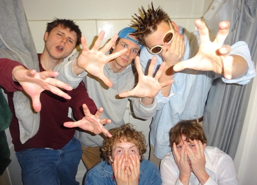 SL4TE band photo, hands out